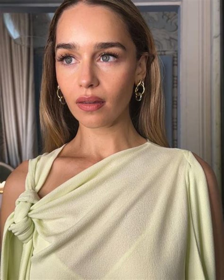 Emilia Clarke sizzles between the sheets as she poses naked after being named the 'Sexiest Woman Alive'